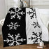 Reversible Snowflake Fleece Blanket with Dual-Sided Stitching.