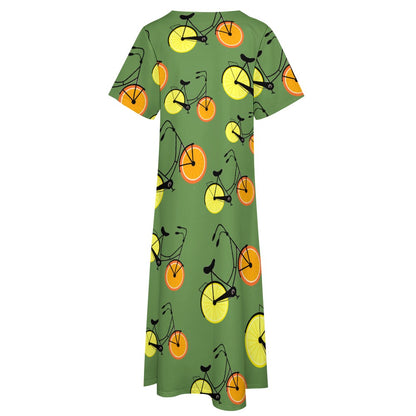 7-point sleeve dress Green with orange and lemon bicycles