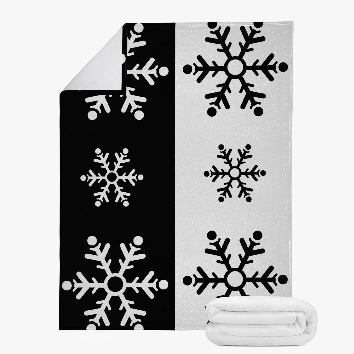 Reversible Snowflake Fleece Blanket with Dual-Sided Stitching.