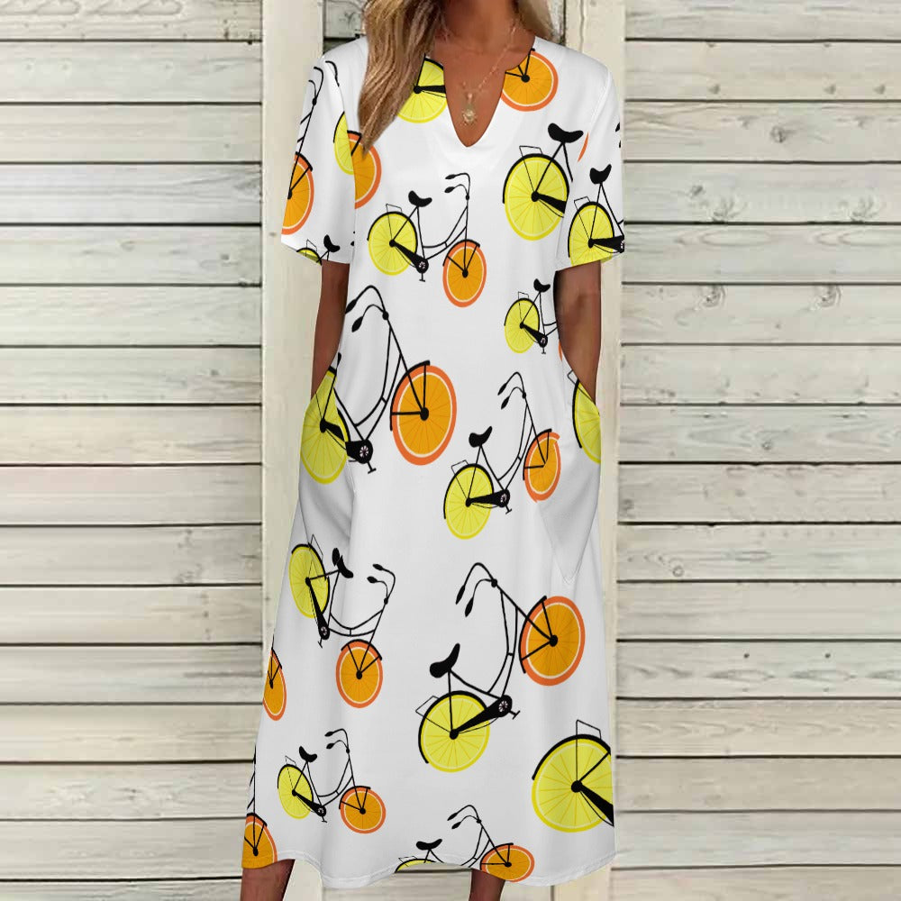 7-point sleeve dress White with orange and lemon bicycles