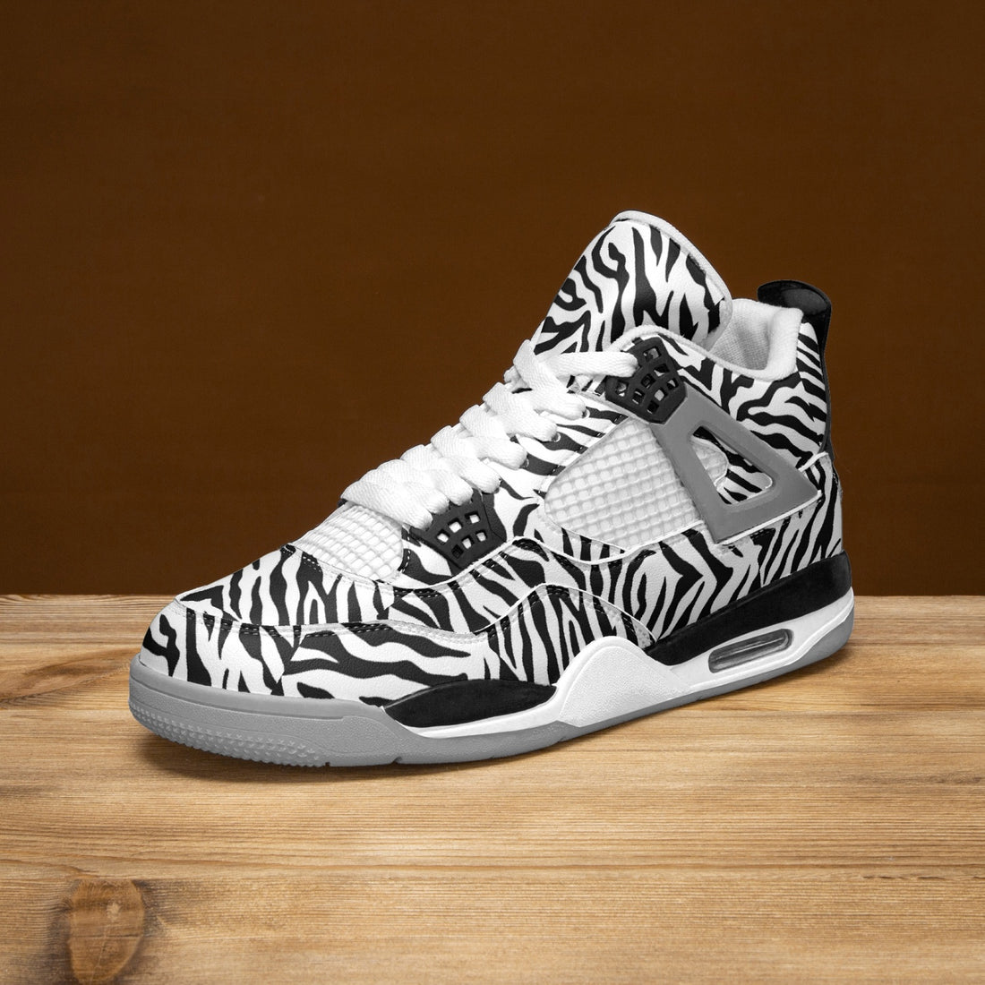 Unique AJ4 Basketball Sneakers with Zebra Print Accents and Grey Sole